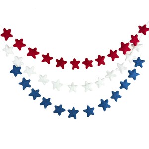 May include: A festive garland with red, white, and blue felt stars. The garland is perfect for decorating for a patriotic holiday.