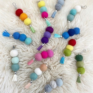 Custom Felt ball keychain or oil diffuser with tassel   You choose 3 or 6 colors, I choose the tassel to coordinate