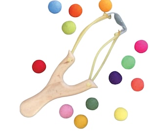 Filzball Schleuder: Holzspielzeug Kugel