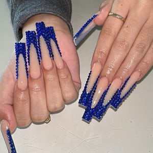 May include: A rustic wooden sign with the text "Welcome to our home" in white lettering. The sign features a distressed finish and a simple, inviting design, perfect for entryway decor.