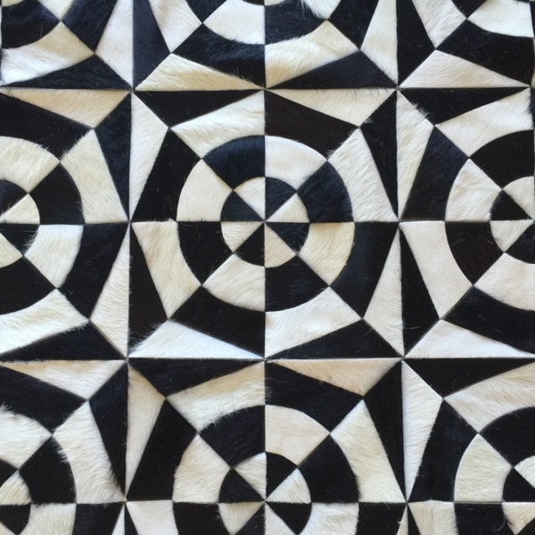 Handmade Black and White Cowhide Patchwork Rug - Tortuguitas cowhide rug