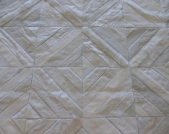 Handmade Cowhide Patchwork Rug: White Diamond Design