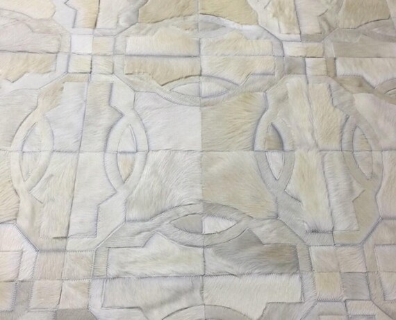 Handmade Cowhide Patchwork Rug: Ivory White Tablada Design
