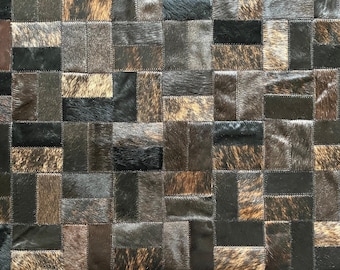 Patchwork Cowhide Rug: Black and Brown Handmade Devoto Model