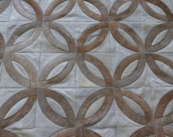 Handmade Cowhide Patchwork Rug: San Telmo Beige & Ivory