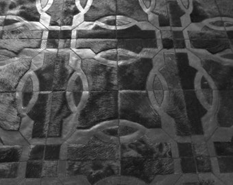 Handmade Black Cowhide Patchwork Rug: Tablada Leather Carpet