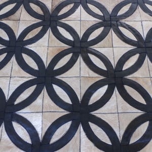 Taupe & Black Cowhide Rug: Patchwork Circles Design