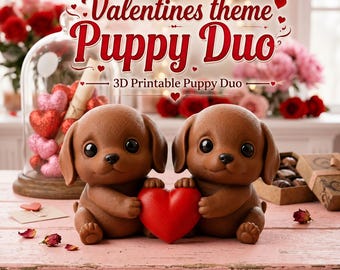 Puede incluir: Dos figuras de cachorros marrones sentadas una al lado de la otra, sosteniendo un gran corazón rojo entre ellas. El texto superior dice Valentines theme Puppy Duo y 3D Printable Puppy Duo. Los cachorros tienen ojos oscuros y lisos.