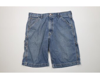Pantalones cortos vaqueros Levi's para hombre, talla 34, estilo carpintero, desgastados, estilo años 2004, color azul. Pantalones cortos vaqueros Levi's vintage. Pantalones cortos vaqueros Levi's vintage.