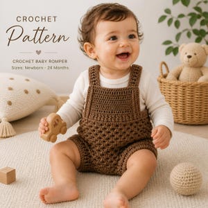 May include: A baby in a brown crochet romper with a white long-sleeved top, smiling at the camera. The image includes the text "CROCHET Pattern" and "CROCHET BABY ROMPER Sizes: Newborn - 24 Months". The baby holds a wooden toy car.