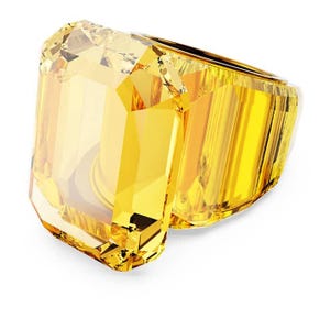 May include: A large, faceted yellow ring with an emerald-cut center stone. The ring's band is also yellow and features a geometric design. The ring is set against a white background, highlighting its bright, sunny color and intricate details.