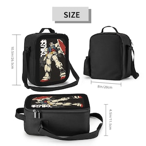 May include: Black lunch bag with a graphic of a robot holding a shield. The bag has a top handle and a shoulder strap. It measures 10.5 inches high, 8 inches wide, and 4.5 inches deep.