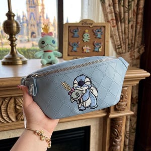 May include: A rustic wooden sign with the text "Welcome to our home" in white lettering. The sign features a distressed finish and a simple, inviting design, perfect for a front porch or entryway.