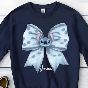 Adorable personalized sweatshirt featuring a cute bow design with custom name. Perfect for birthdays, Disney trips, school outfits, vacations, and everyday wear. Soft and comfortable kids crewneck sweatshirt made for stylish little girls.

✔ Personalized with name
✔ Cute bow front design
✔ Soft kids sweatshirt
✔ Great birthday gift
✔ Perfect Disney vacation outfit