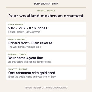 May include: A round, glossy ceramic woodland mushroom ornament measuring 2.87 x 2.87 x 0.16 inches. The front features printed artwork, while the reverse is plain. It includes a gold cord and allows for a 24-character name and year line.