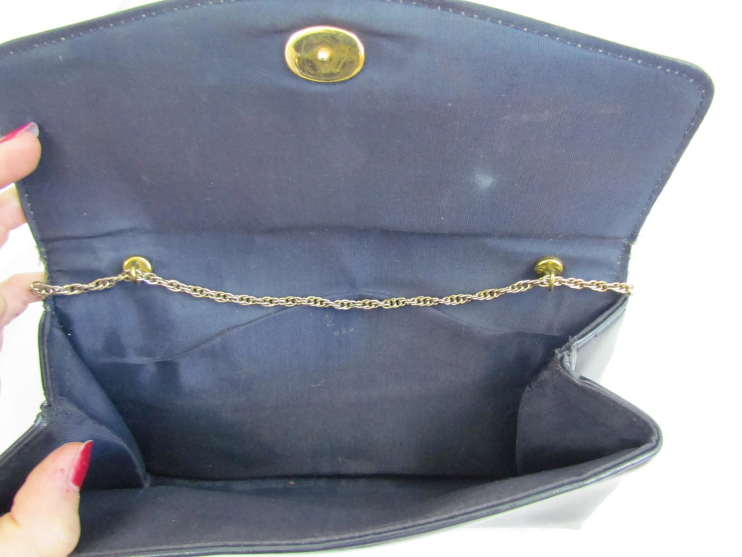 navy blue patent clutch bag