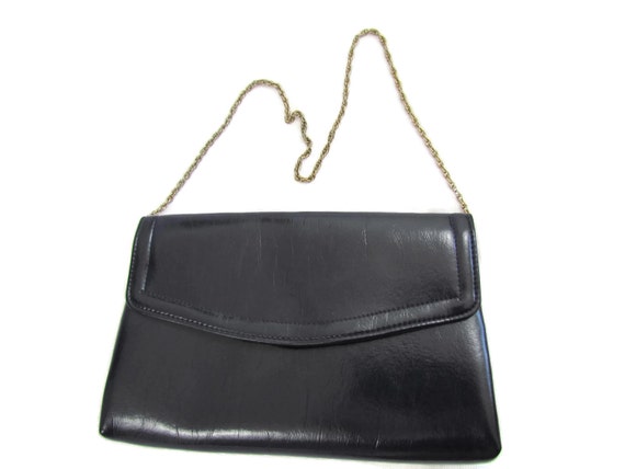 blue patent clutch bag