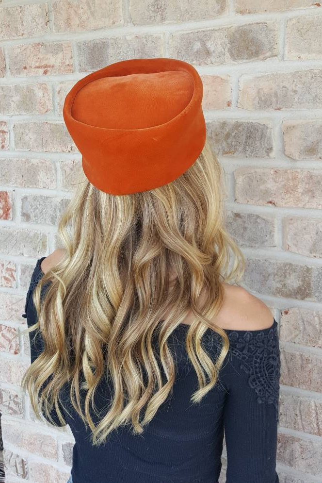 orange pillbox hat