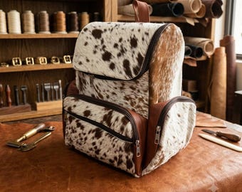 Handmade Cowhide Backpack Bag: Natural Fur, Leather Accents, Spacious Travel Companion
