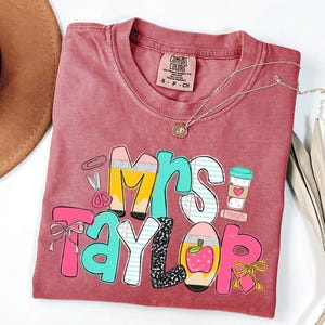 Comfort Colors® Personalized Floral Pattern Teacher T-Shirt, Custom Mrs Name Soft Patch Letter Tee. Trendy Back to School Gift Shirt.