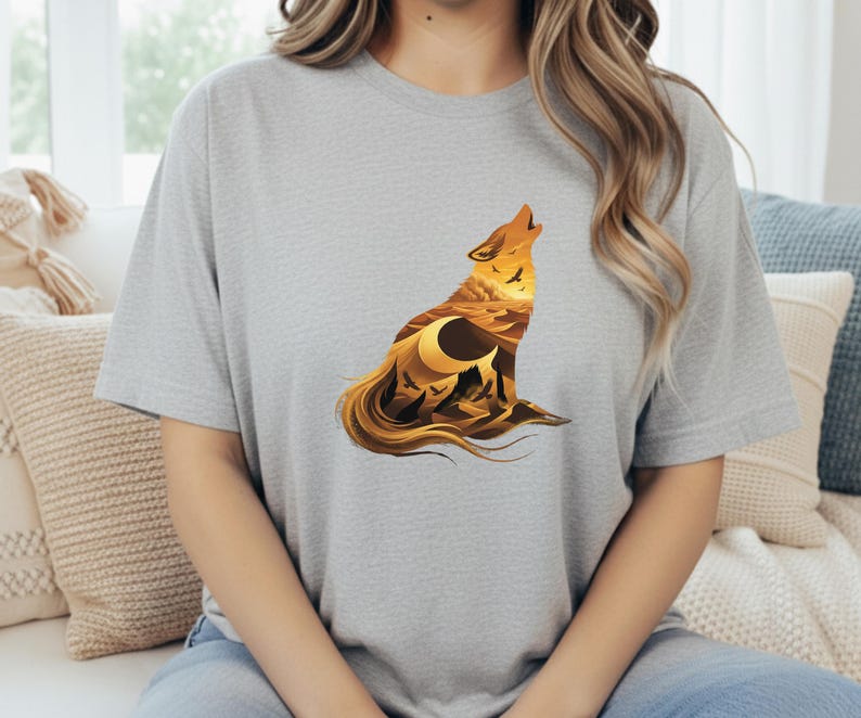 A woman in a grey t-shirt showcasing the modern double-exposure wolf art with sharp geometric vectors and desert textures.