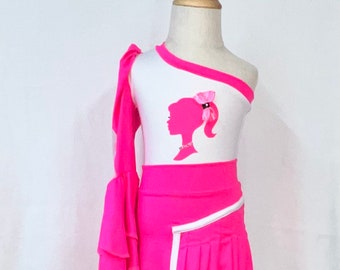 Neon pink doll inspired one shoulder leotard with matching skirt with pleat inset