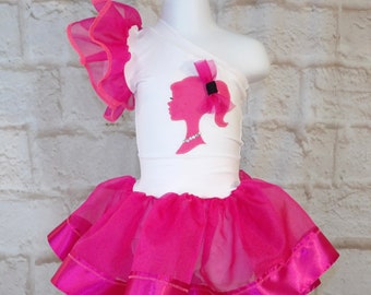 Doll inspired leotard with hot pink flutter sleeve and hot pink skirt with ribbon edge