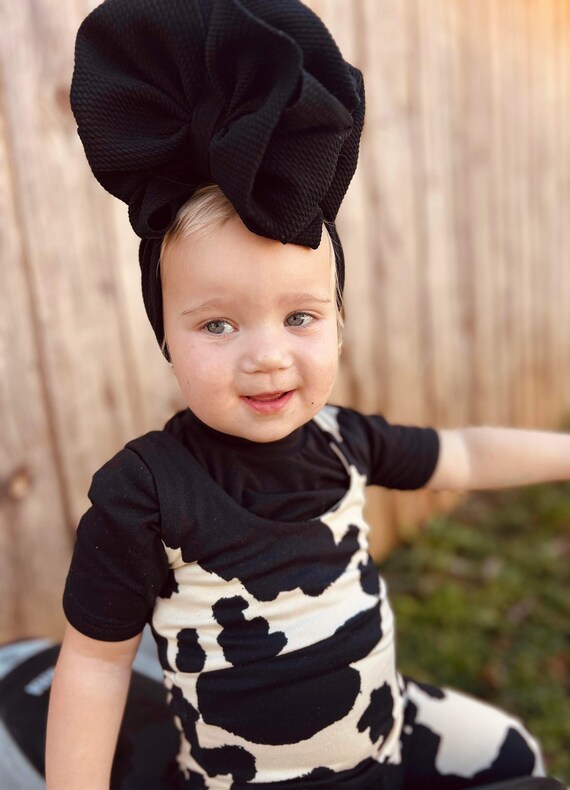 Black and Tan Cow Print Bell Bottom Overalls With Black Mock