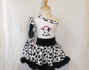 One shoulder bell sleeve cow print leotard with ruffled circle skirt or double bell bottom pants