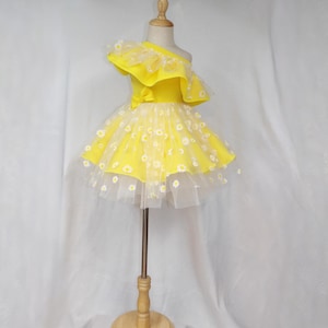 Yellow ruffled one shoulder dress with daisy tulle overlay, pageant dress
