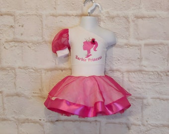 Doll inspired leotard with puff sleeve and pink white skirt with ribbon edge