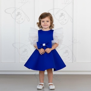 Blue flutter sleeve high low hem dress/bow back dress
