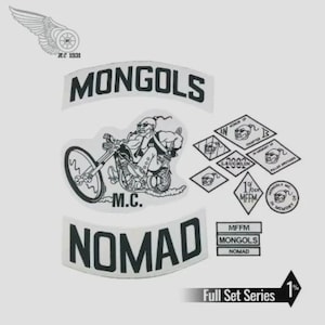 May include: A collection of black and white embroidered patches featuring the text MONGOLS M.C. NOMAD, a graphic of a person riding a motorcycle, various diamond-shaped emblems with skull imagery, and rectangular labels with the text MFFM MONGOLS NOMAD.
