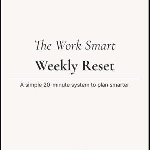 May include: A cream-colored poster with black text. The title reads "The Work Smart Weekly Reset." Below, it says "A simple 20-minute system to plan smarter." The bottom of the poster says "Work Smart. Edit Life."
