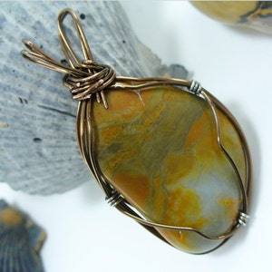 Tan Ochre Umber Brown Rust Blue White Found Stone Beach Rock Tumbled Picture Jasper Chalcedony Agate Antiqued Copper Wire-wrapped pendant