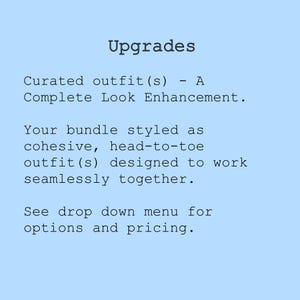 May include: A light blue background with the word "Upgrades" in a dark font. Text below describes curated outfits as a complete look enhancement, styled as a cohesive, head-to-toe outfit. The text also mentions a drop-down menu for options.