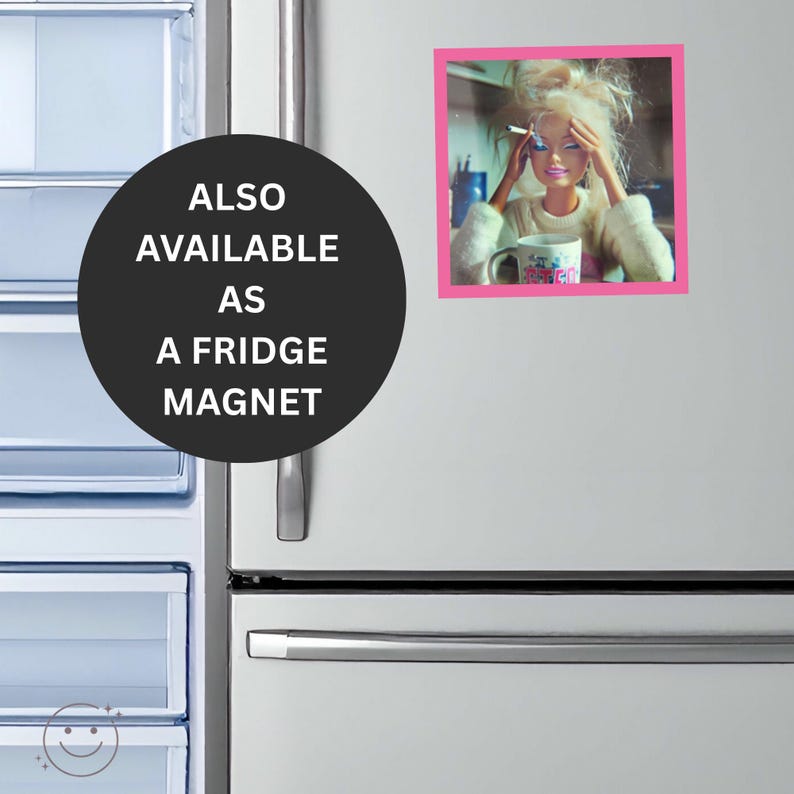 May include: A square fridge magnet featuring a doll with blonde hair, wearing a white sweater, holding a cigarette, and resting hands on the head. The doll is positioned behind a white mug. The magnet has a bright pink border frame.