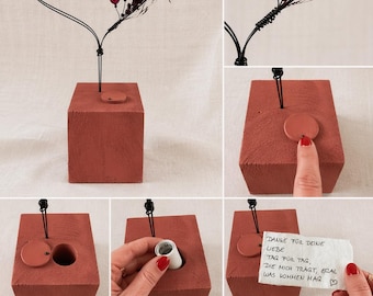 Corazón de alambre con un tesoro dentro