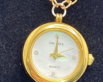The Oryx Gold Tone Mop Dial Watch Necklace Works New Battery