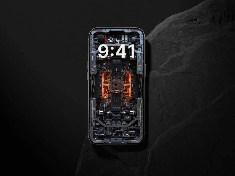 Könnte beinhalten: Ein Smartphone mit detaillierter Innenansicht, das komplizierte Schaltkreise und leuchtend orangefarbene Komponenten zeigt. Der Bildschirm zeigt die Uhrzeit 9:41 Uhr und den Tag Dienstag vor dunklem Hintergrund.