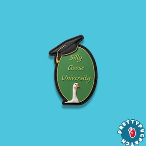 May include: A green oval patch with the words "Silly Goose University" and a cartoon goose. The patch is topped with a black graduation cap. The patch is on a blue background.