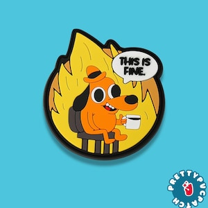 May include: A round, orange and black patch featuring a cartoon dog sitting in a chair, holding a coffee cup, and surrounded by flames. A speech bubble says "THIS IS FINE." The patch has a black border and a blue background.