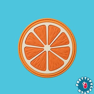 May include: A circular orange slice patch featuring a vibrant orange fruit segment design with a cream-colored border and center. The graphic displays eight distinct segments with textured details. The text Pretty Patch is visible in the corner.