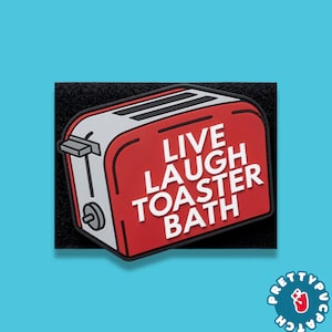 May include: A red and white toaster patch with the words "LIVE LAUGH TOASTER BATH" in white block letters. The patch is on a black background and has a blue background.