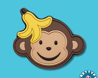 Cute Monkey with Banana Peel PVC Patch Hook and Loop Funny Brown Monkey Face Rubber Morale Badge for Backpacks Jackets and Hats