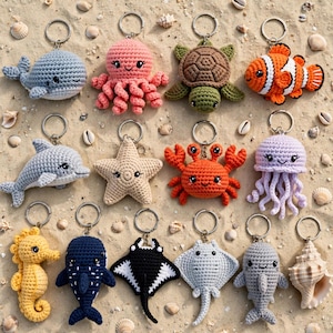 May include: A collection of fourteen crocheted sea creature keychains, including a whale, octopus, turtle, clownfish, dolphin, starfish, crab, jellyfish, seahorse, whale shark, manta ray, stingray, shark, and a seashell, each with a metal ring.