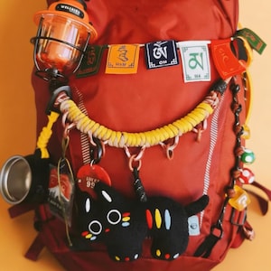 Handmade Paracord Backpack Charm.Custom braided bag accessory.
