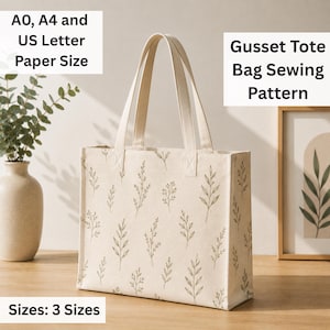 May include: A cream-colored gusset tote bag featuring a repeating green botanical leaf pattern and two shoulder straps. Text on the image reads: A0, A4 and US Letter Paper Size, Gusset Tote Bag Sewing Pattern, and Sizes: 3 Sizes.