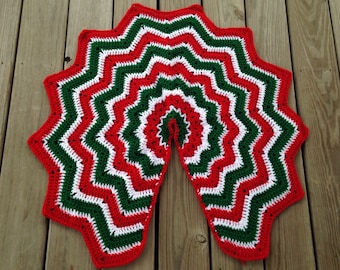 Crochet red, green, and white Christmas tree skirt