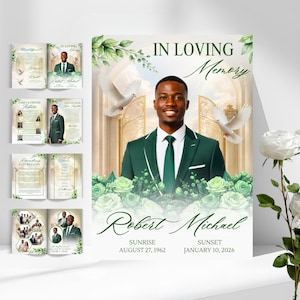 May include: A memorial poster with the text "In Loving Memory" and the name "Robert Michael." The poster features a portrait of a man in a green suit, doves, and floral accents. Additional memorial booklets are displayed.